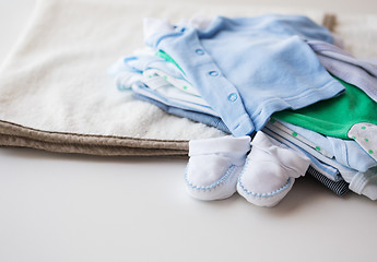 Image showing close up of baby boys clothes for newborn on table