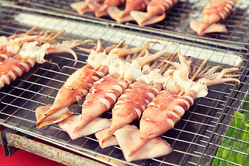 Image showing grilled squids at street market