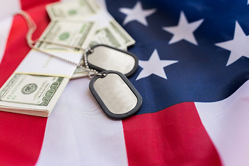 Image showing american flag, dollar money and military badges