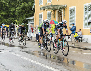 Image showing Group of Cyclists Riding in the Rain - Tour de France 2014