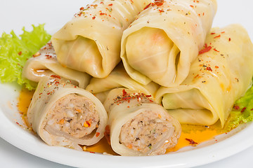 Image showing cabbage rolls with carrots and rice