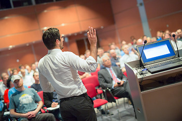 Image showing Public speaker giving talk at Business Event.