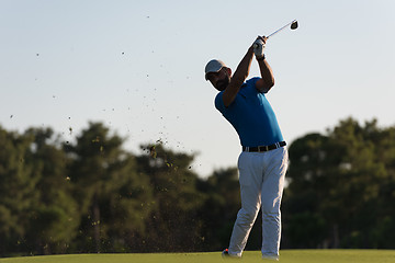 Image showing golfer hitting long shot