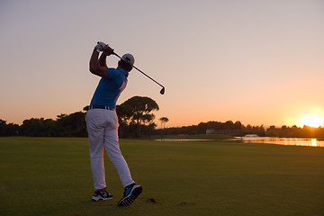 Image showing golfer hitting long shot