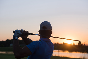 Image showing golfer hitting long shot