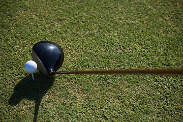 Image showing top view of golf club and ball in grass