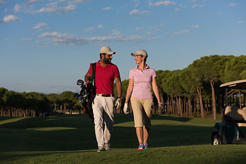 Image showing couple walking on golf course