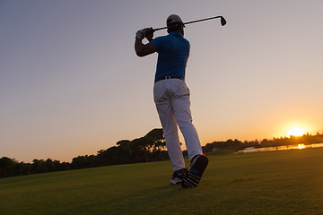 Image showing golfer hitting long shot