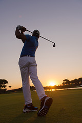 Image showing golfer hitting long shot