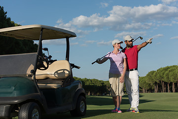 Image showing portrait of golfers couple on golf course