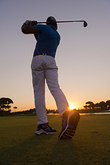 Image showing golfer hitting long shot