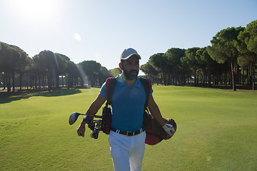 Image showing golf player walking