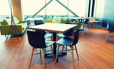 Image showing restaurant interior with table and chairs