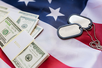 Image showing american flag, dollar money and military badges