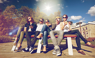 Image showing group of students or teenagers drinking coffee