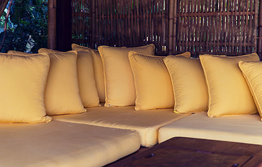 Image showing couch with pillows at hotel terrace