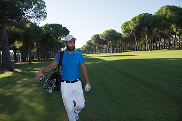 Image showing golf player walking