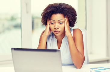 Image showing african woman with laptop at office