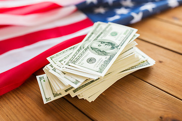 Image showing close up of american flag and dollar cash money