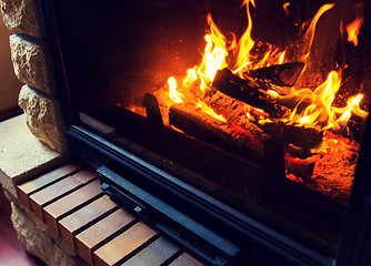 Image showing close up of burning fireplace at home