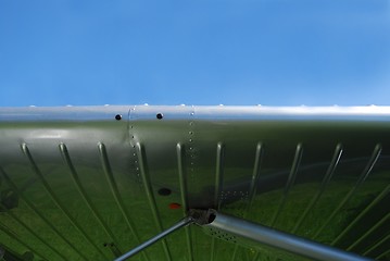 Image showing airplane reflection