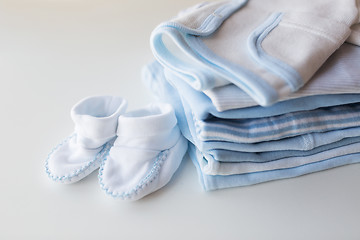 Image showing close up of baby boys clothes for newborn on table