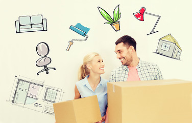 Image showing couple with delivery boxes moving to new home