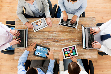 Image showing business team with laptop and tablet pc computers