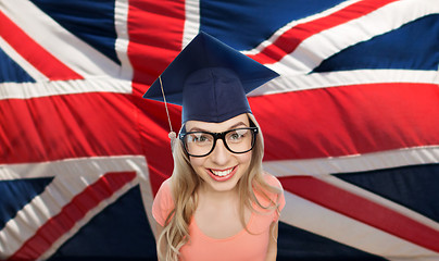 Image showing student woman in mortarboard over english flag