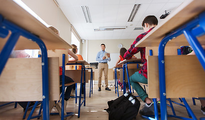 Image showing students and teacher with tablet pc at school