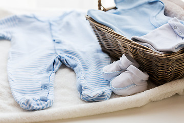 Image showing close up of baby clothes for newborn boy in basket