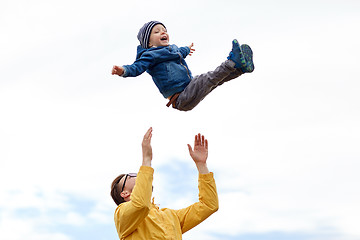 Image showing father with son playing and having fun outdoors