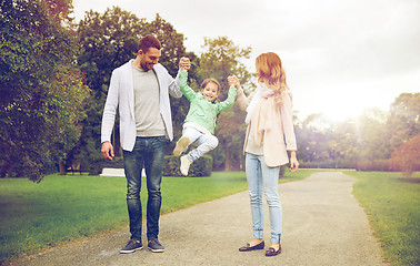 Image showing happy family walking in summer park and having fun