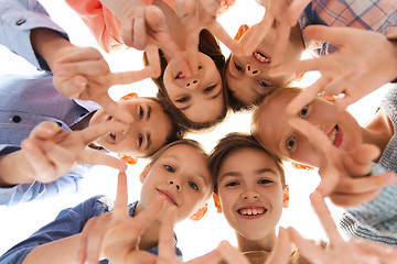 Image showing happy children showing peace hand sign