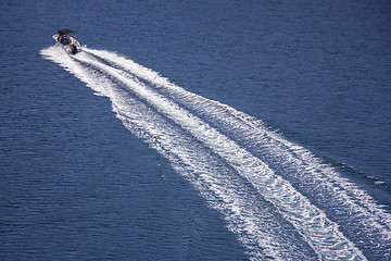 Image showing Speedboat rides on the sea