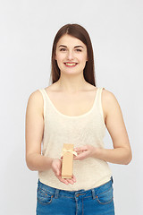 Image showing Young woman with gift