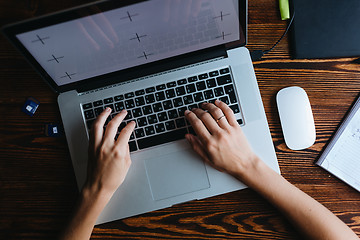 Image showing Female designer working on computer