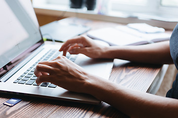 Image showing girl working on computer