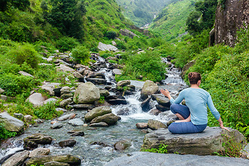 Image showing Woman doing Ashtanga Vinyasa Yoga asana Marichyasana D