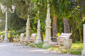 Image showing Alley with several benches in the city park \