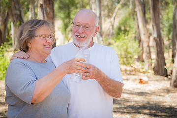 Image showing Happy Healthy Senior Couple with Water Bottles