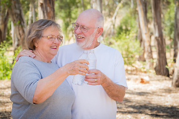 Image showing Happy Healthy Senior Couple with Water Bottles