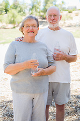 Image showing Happy Healthy Senior Couple with Water Bottles