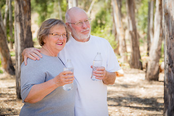 Image showing Happy Healthy Senior Couple with Water Bottles