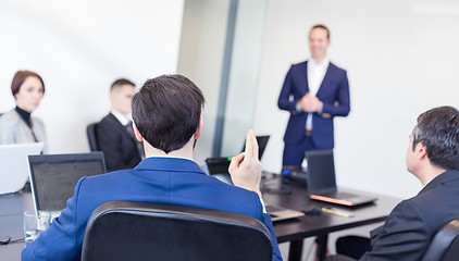 Image showing Colleague asking question to business team leader.