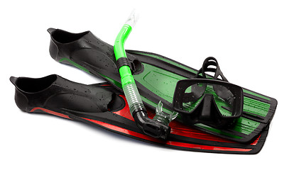 Image showing Mask, snorkel and flippers of different colors with water drops