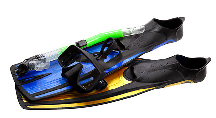 Image showing Mask, snorkel and flippers of different colors with water drops