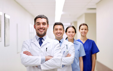 Image showing group of happy medics or doctors at hospital