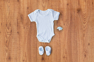 Image showing close up of baby boys clothes for newborn on table