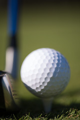 Image showing golf club and ball in grass